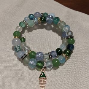 Elegant Beaded Bracelet with Fish Charm